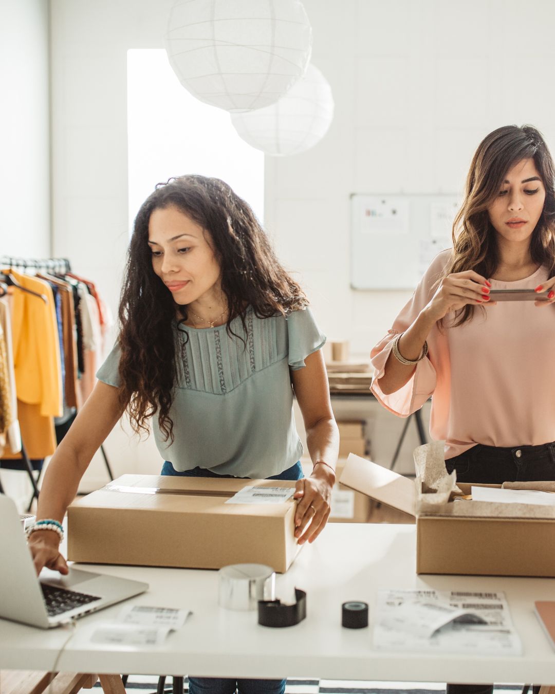 business women packing orders